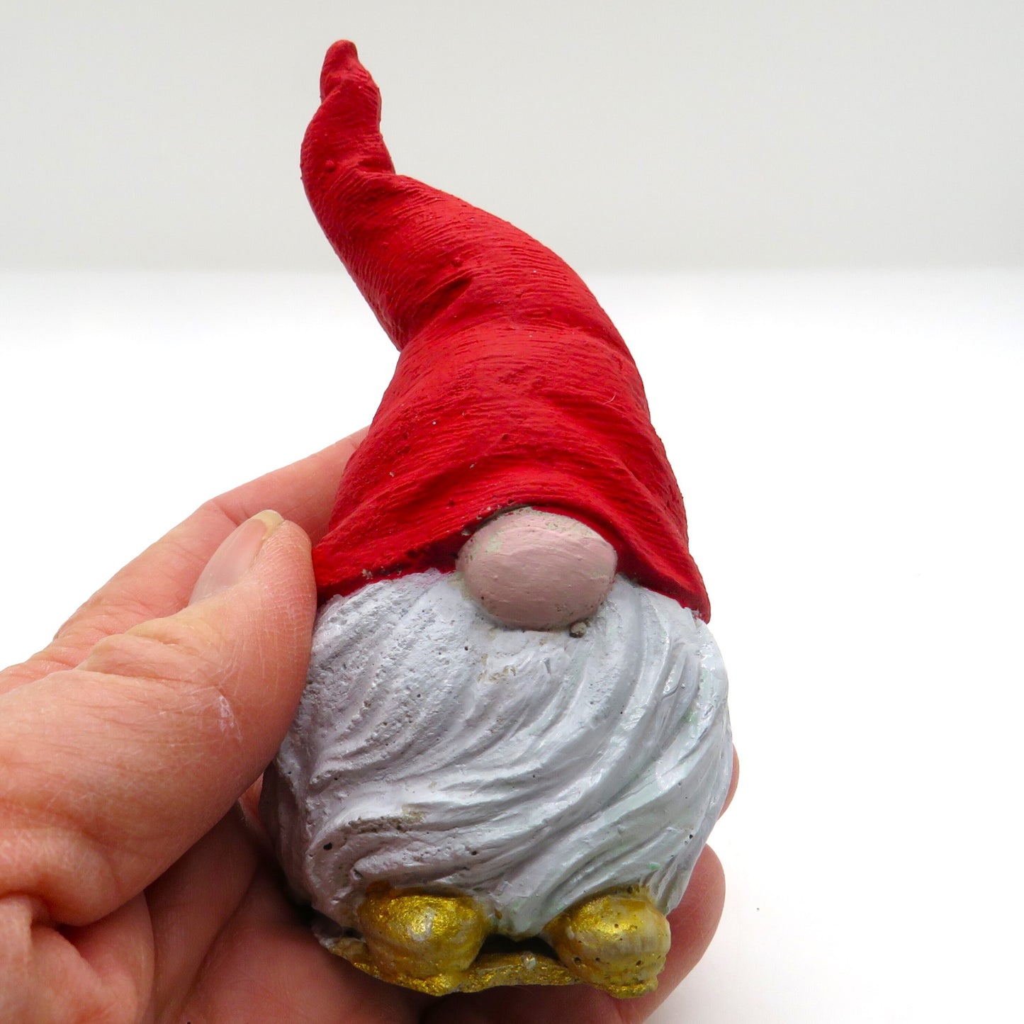 Miniature gnome with pointed hat and long beard: Holiday, home, office, or garden decor. Handmade cement statue.