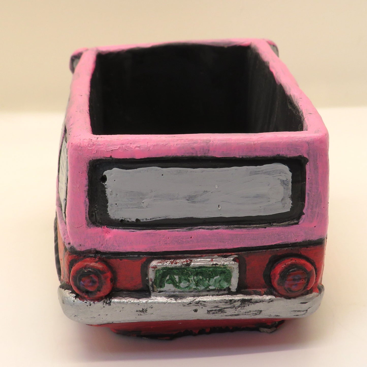 Handcrafted Pink Bus Cement Planter – Unique Colorado License Plate Theme, Ideal for Succulents & Small Plants
